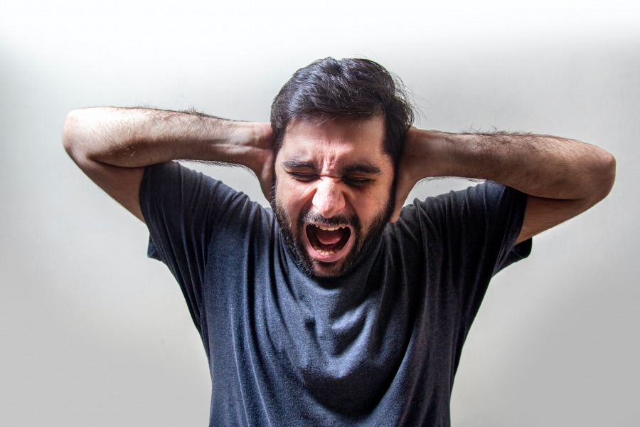 A man experienced COVID-19-related anger, fear, and anxiety.